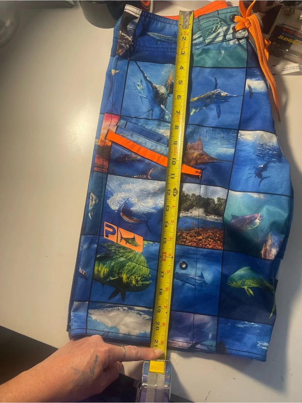 Pelagic Blue Ocean Photo-Block Swim Shorts with Orange Accents